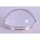 A MODERN SILVER AND CRYSTAL PAPERWEIGHT. 8.75 cm wide.