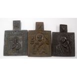 THREE RUSSIAN BRONZE ICONS, decorated with religious figures. 5.6 cm long.