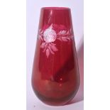 AN EARLY 20TH CENTURY RUBY RED BOHEMIAN CUT GLASS VASE, etched with roses and floral banding. 18 cm