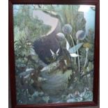 A FRAMED LUSTRE PICTURE DEPICTING A FAIRY IN A LANDSCAPE, surrounded by animals and mythical beings