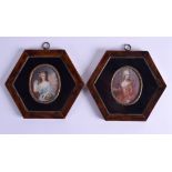 A PAIR OF EARLY 20TH CENTURY PAINTED IVORY PORTRAIT MINIATURES within faux tortoiseshell frames. 6.