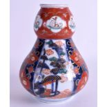 A RARE 19TH CENTURY JAPANESE MEIJI PERIOD IMARI VASE with facetted body. 32 cm high.