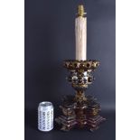 A GOOD 19TH CENTURY BOHEMIAN RUBY GILT GLASS CANDLESTICK painted with swags and vines. Glass 32 cm