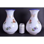 A LARGE PAIR OF 19TH CENTURY OPALINE GLASS VASES painted with flowers and trailing ribbons. 30.5 cm