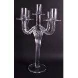 A WILLIAM YEOWARD CRYSTAL FOUR BRANCH CANDLESTICK. 38 cm high.