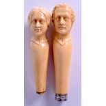 A PAIR OF 19TH CENTURY CONTINENTAL CARVED IVORY CANE HANDLES. 13 cm long.