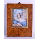 A 19TH CENTURY PAINTED IVORY PORTRAIT MINIATURE modelled in blue robes. 8 cm x 10 cm.