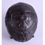 AN EARLY 19TH CENTURY CARVED COCONUT BUGBEAR POWDER FLASK decorated with foliage and arms. 13 cm x