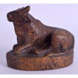 AN UNUSUAL 17TH/18TH CENTURY INDIAN CARVED AGATE FIGURE OF A COW modelled recumbent. 11 cm x 10 cm.