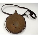 A VINTAGE MILITARY ENAMEL WATER FLASK, formed with a leather strap. 24.5 cm x 18.5 cm.