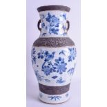 A LARGE 19TH CENTURY CHINESE CRACKLE GLAZED BLUE AND WHITE VASE painted with birds and foliage. 43.