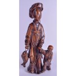 A 19TH CENTURY CHINESE CARVED HARDWOOD FIGURE OF A FEMALE modelled holding a child's hands. 35 cm h