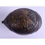 AN EARLY 19TH CENTURY CARVED COCONUT BUGBEAR POWDER FLASK decorated with arms and lovebirds. 13 cm