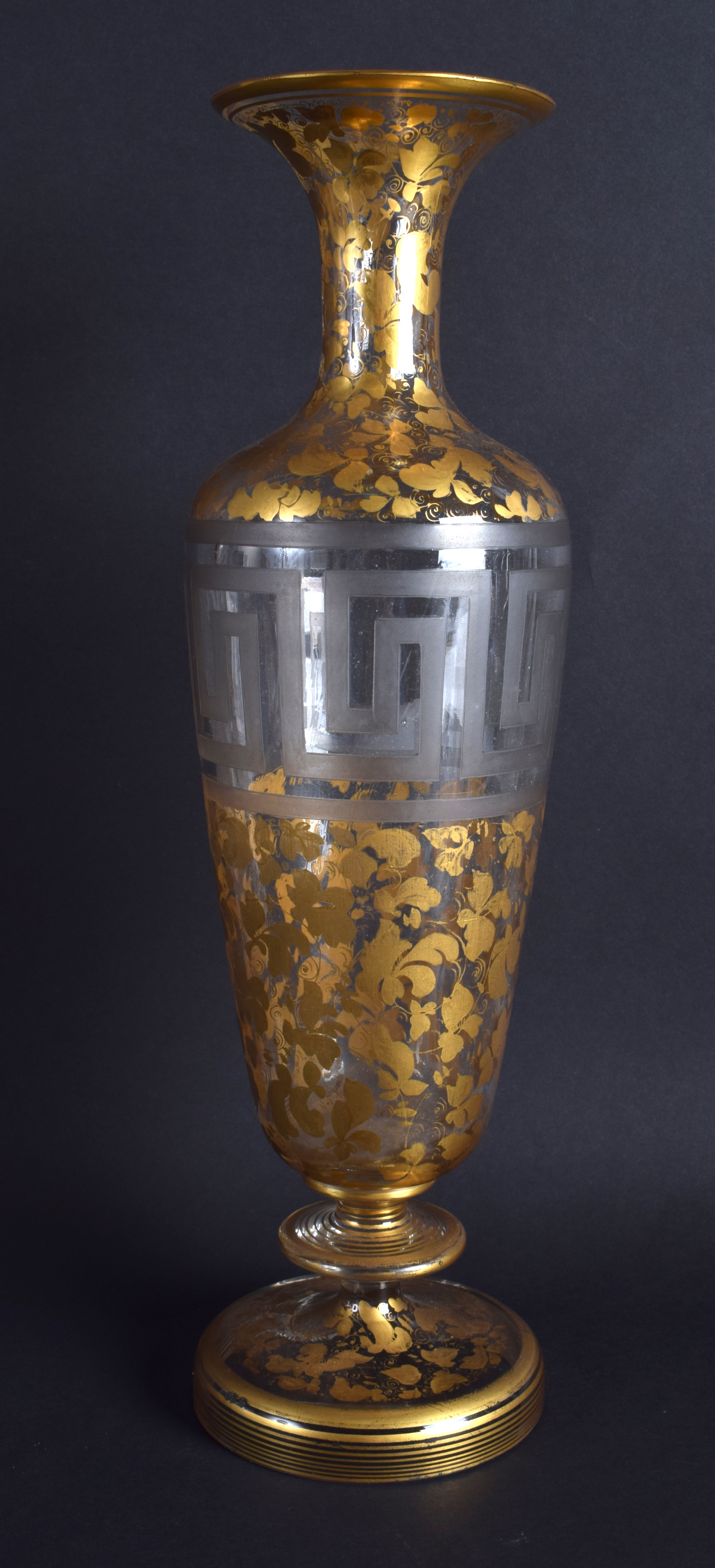 A 19TH CENTURY BOHEMIAN CLEAR AND GILT GLASS VASE painted with flowers. 32 cm high.