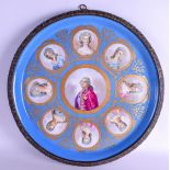 A LARGE 19TH CENTURY FRENCH SEVRES PORCELAIN WALL CHARGER painted with figures upon a blue ground.