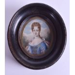 AN 18TH/19TH CENTURY PAINTED IVORY PORTRAIT MINIATURE painted with a female within a blue dress. 6.