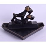 A STYLISH 1950S AUSTRIAN FIGURE OF TWO HOUNDS Attributed to Hagenauer. 9 cm x 5.5 cm.