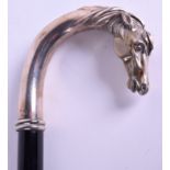 AN ANTIQUE CONTINENTAL SILVER HORSE HEAD WALKING CANE. 90 cm long.