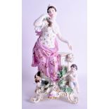 A RARE LARGE 18TH CENTURY MEISSEN PORCELAIN FIGURE OF A FEMALE modelled with a putti upon a rococo