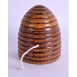 AN ANTIQUE TREEN BEEHIVE STRING BOX AND COVER. 9.5 cm high.