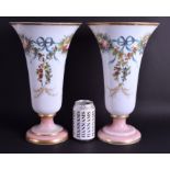 A LARGE PAIR OF 19TH CENTURY OPALINE GLASS VASES painted with flowers and trailing ribbons. 35.5 cm