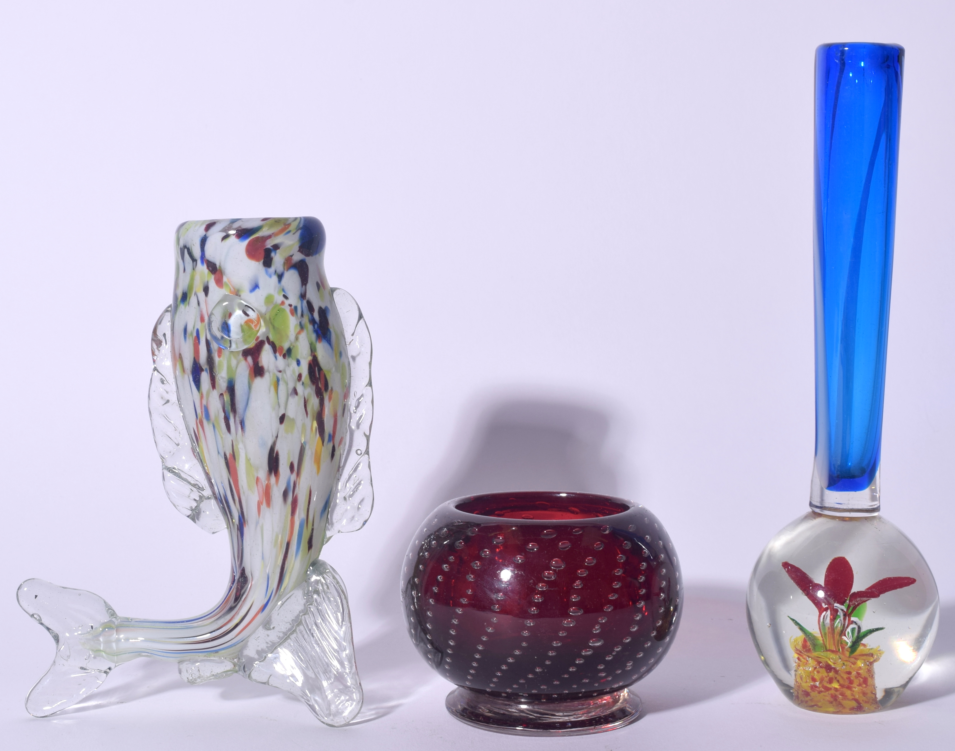 AN ITALIAN MURANO GLASS FIGURAL VASE IN THE FORM OF A FISH, together with a posy vase and a red gla