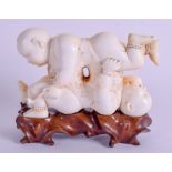 A RARE 19TH CENTURY CHINESE CARVED IVORY EROTIC GROUP Late Qing. 12.5 cm x 8 cm.