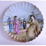 A RARE LARGE EARLY 20TH CENTURY JAPANESE MEIJI PERIOD PORCELAIN CHARGER finely painted with six gei