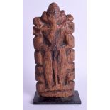 AN 18TH CENTURY INDIAN CARVED WOOD FRAGMENT FIGURE with original patina. 21 cm high.