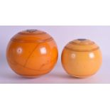 TWO SCOTTISH CATALIN AMBER BAKELITE BOWLS Thomas Taylor Glasgow. 1179 grams & 611 grams. 11 cm & 8