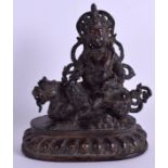 A 19TH CENTURY CHINESE TIBETAN BRONZE FIGURE OF A BUDDHA modelled seated upon a Buddhistic lion. 21