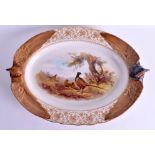 A RARE LARGE ANTIQUE ROYAL WORCESTER SERVING DISH decorated with game birds. 41 cm x 31 cm.