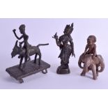 A 19TH CENTURY INDIAN BRONZE FIGURE OF A DEITY together with a pottery tribal figure & a Benin type