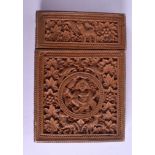 A 19TH CENTURY ANGLO INDIAN CARVED WOOD CARD CASE AND COVER decorated with figures. 7.5 cm x 10.5 c