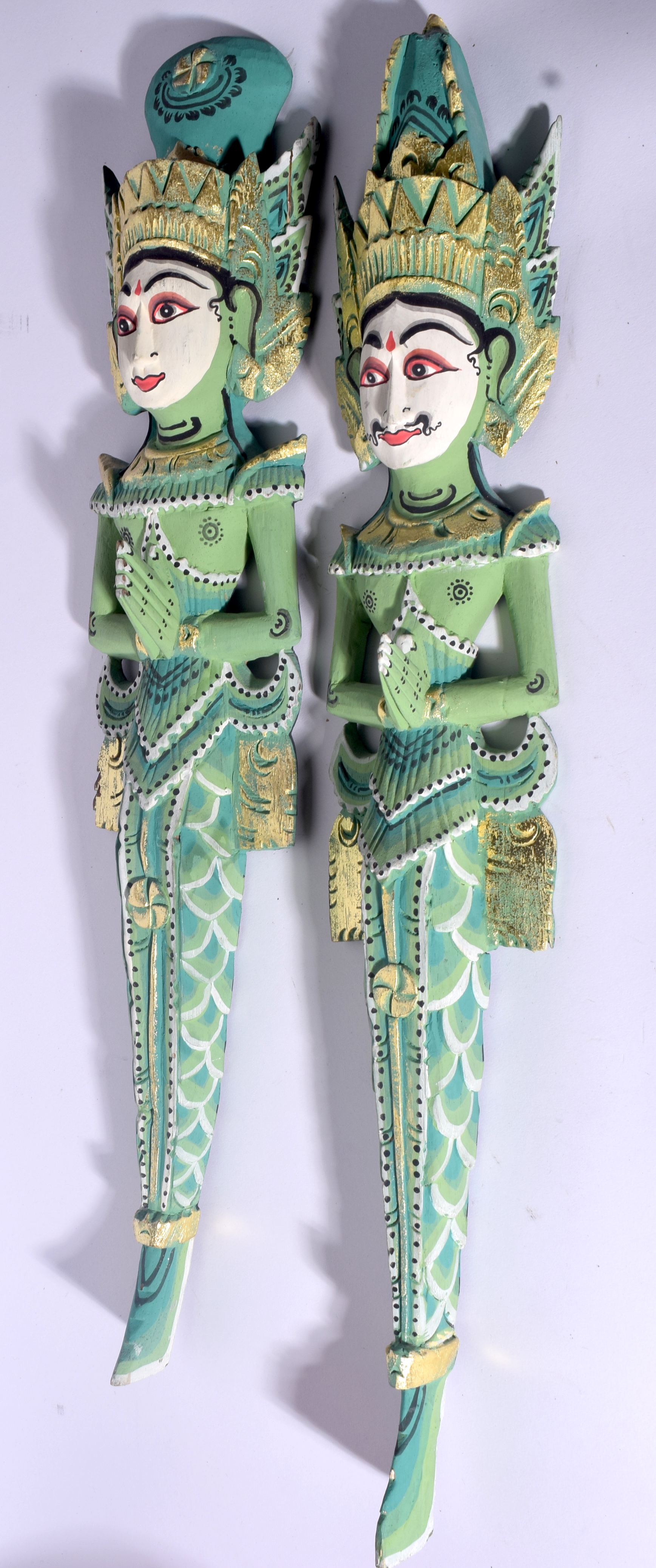 A PAIR OF MODERN THAI WOODEN WALL HANGING, formed with hands clasped. 60 cm long.