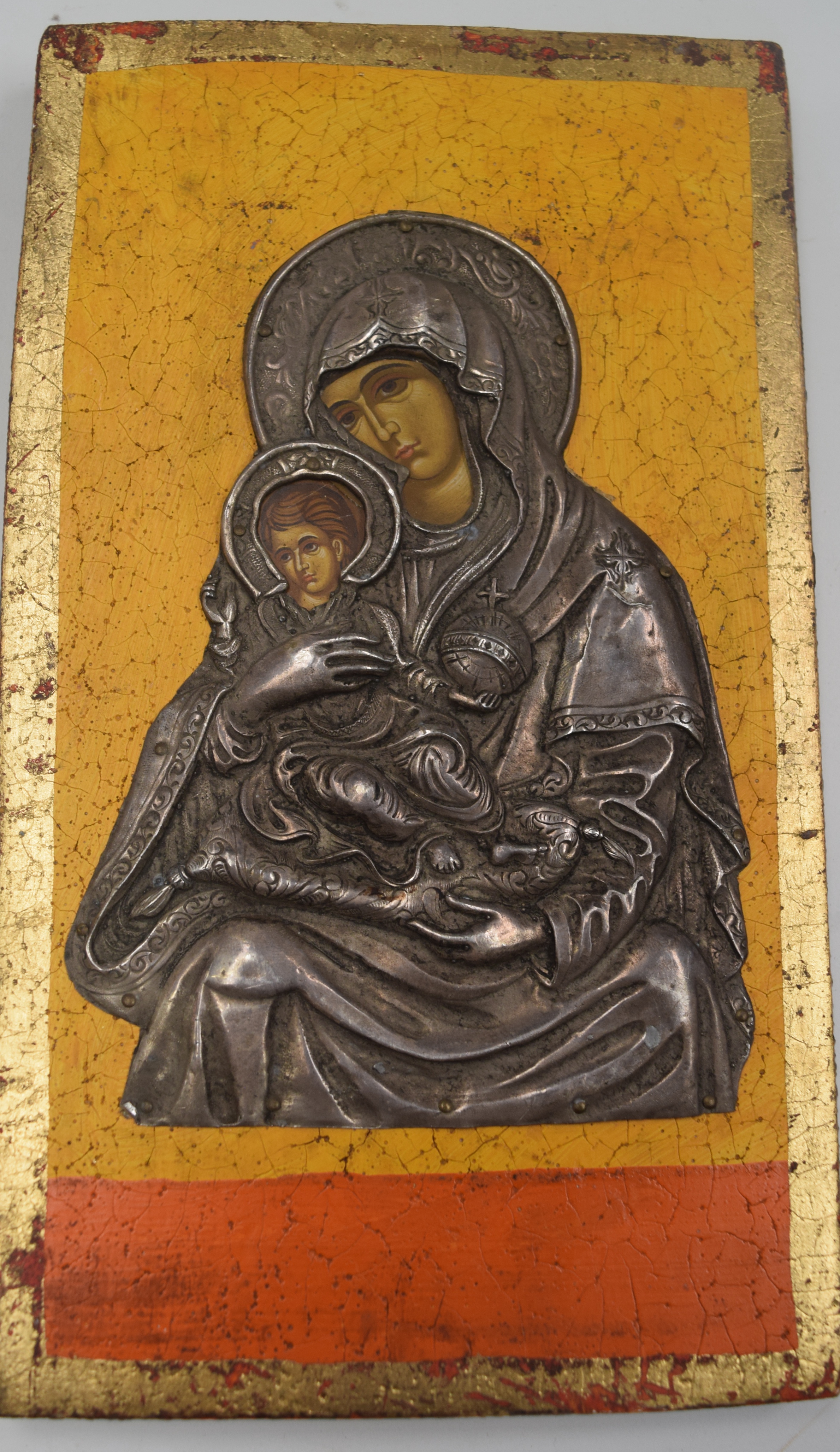 A RUSSIAN SILVER LACQUERED ICON, depicting a religious scene. 16.5 cm x 15 cm