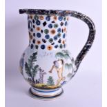 A 19TH CENTURY FRENCH FAIENCE TIN GLAZED POTTERY PUZZLE JUG painted with figures within landscapes.