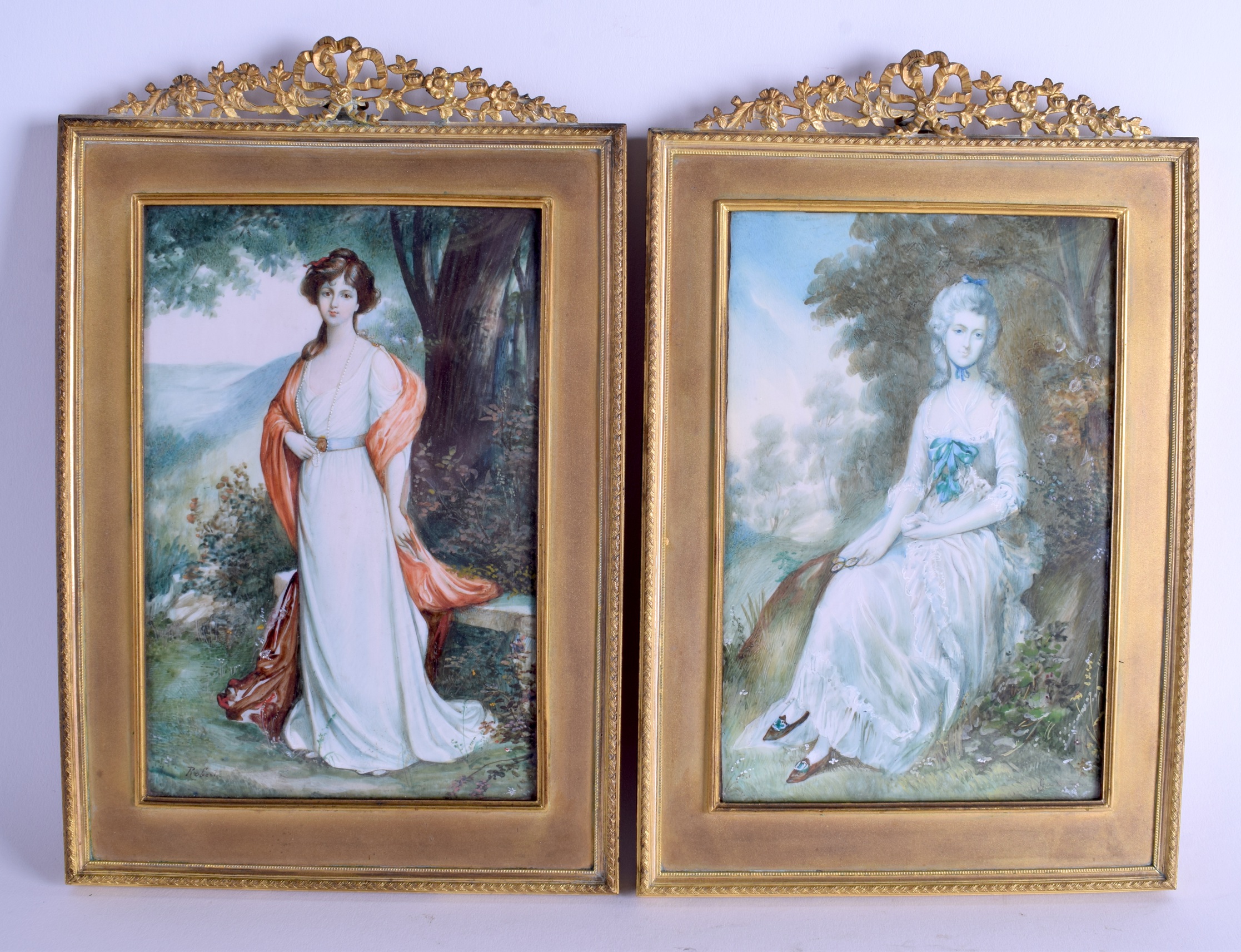 A LARGE PAIR OF 19TH CENTURY CONTINENTAL IVORY MINIATURE painted with females within landscapes. Im