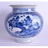 AN 18TH CENTURY JAPANESE EDO PERIOD BLUE AND WHITE VASE painted with landscapes. 20 cm x 20 cm.