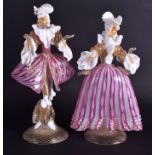 A PAIR OF 1950S MURANO VENETIAN GLASS FIGURES modelled in opaque twist robes. 27 cm & 24 cm high.