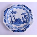 AN 18TH CENTURY BOW BLUE AND WHITE OCTAGONAL PLATE decorated with flowering rock and foliage. 21 cm