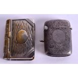A VINTAGE SILVER VESTA CASE together with another. (2)