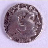 A SILVER COIN. 2.5 cm wide.