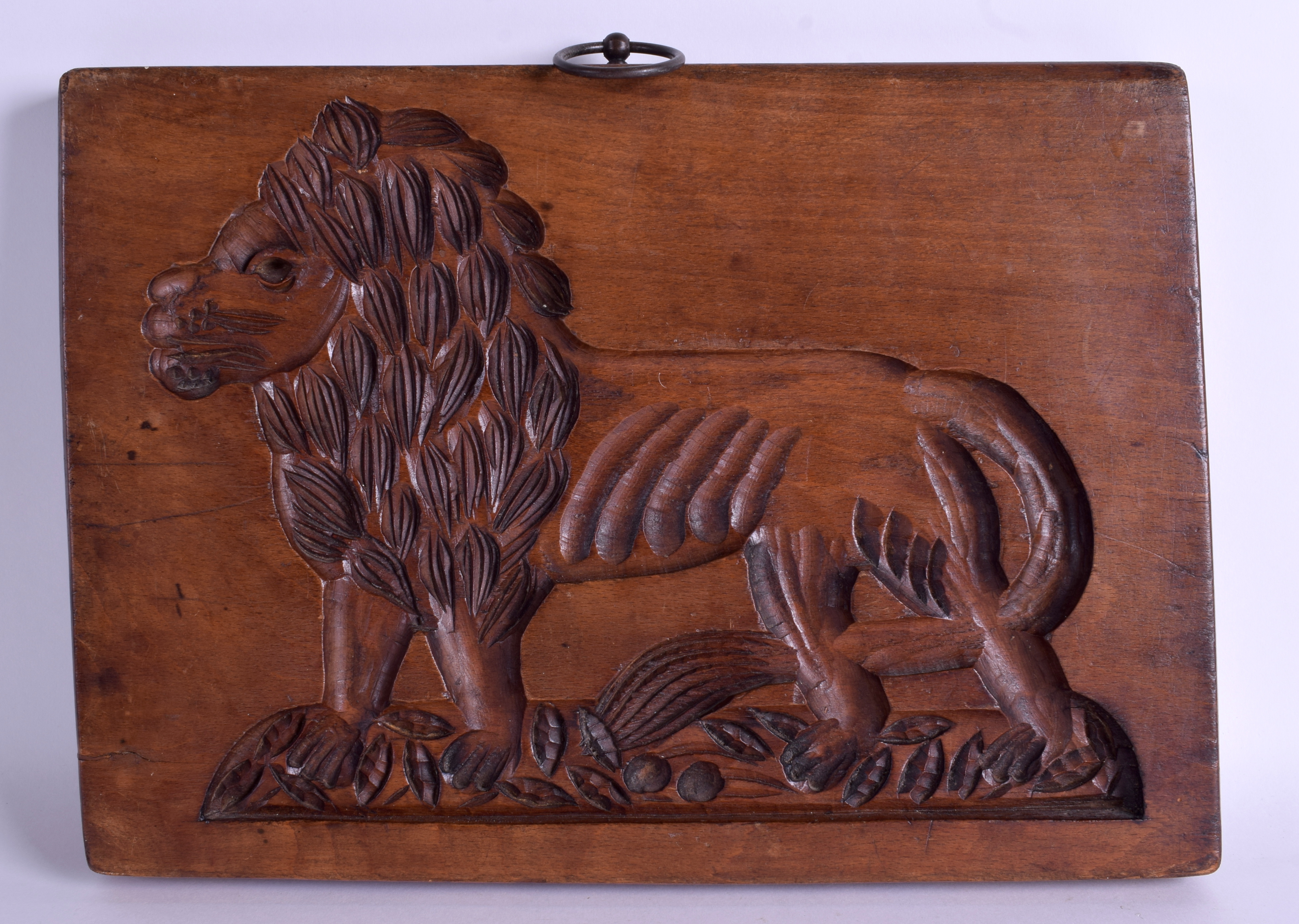 AN EARLY 19TH CENTURY TREEN GINGER BREAD MOULD depicting a lion to one side & horse to the other. 3