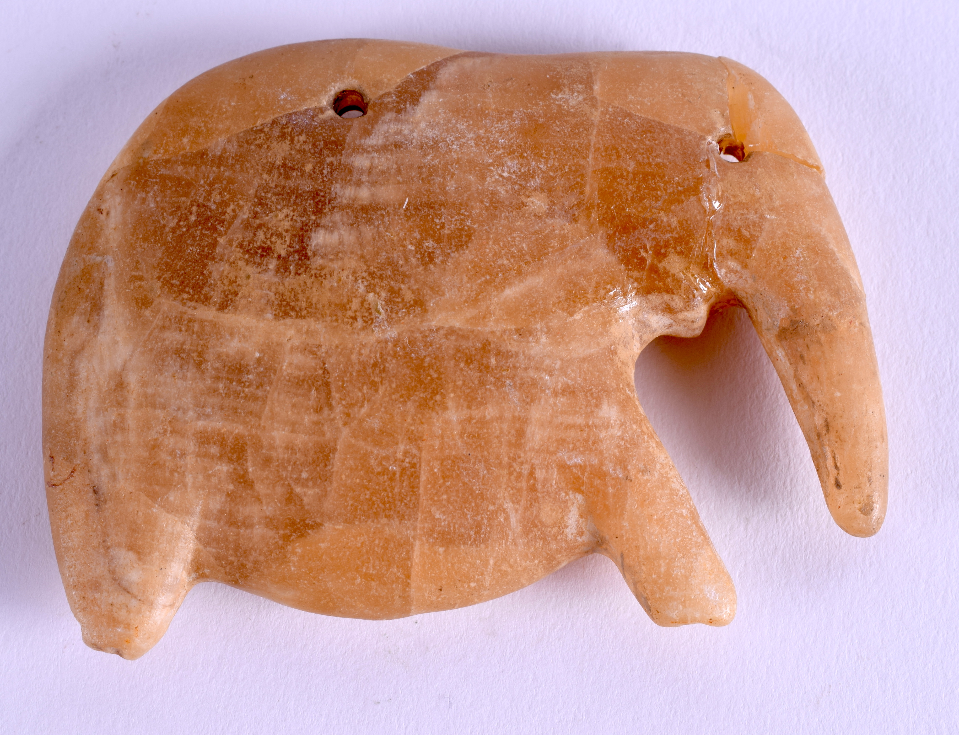 AN ANTIQUITY ALABASTER ELEPHANT. 8.5 cm x 6 cm.