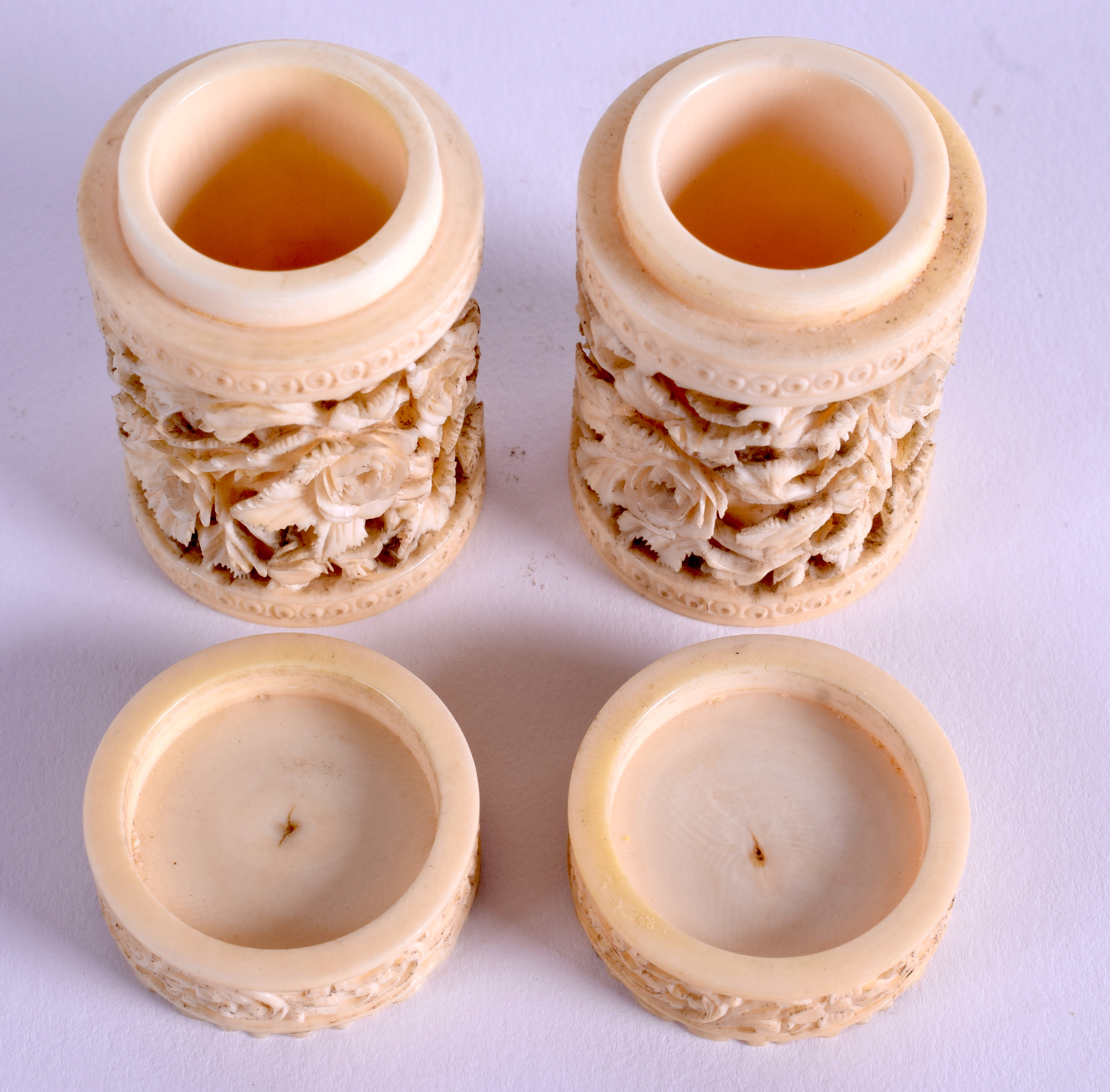 A PAIR OF 19TH CENTURY CHINESE CARVED IVORY CANS. 4.5 cm high. - Image 3 of 3