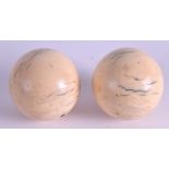 TWO VICTORIAN CARVED IVORY SNOOKER BALLS. 228 grams. 4.25 cm wide. (2)