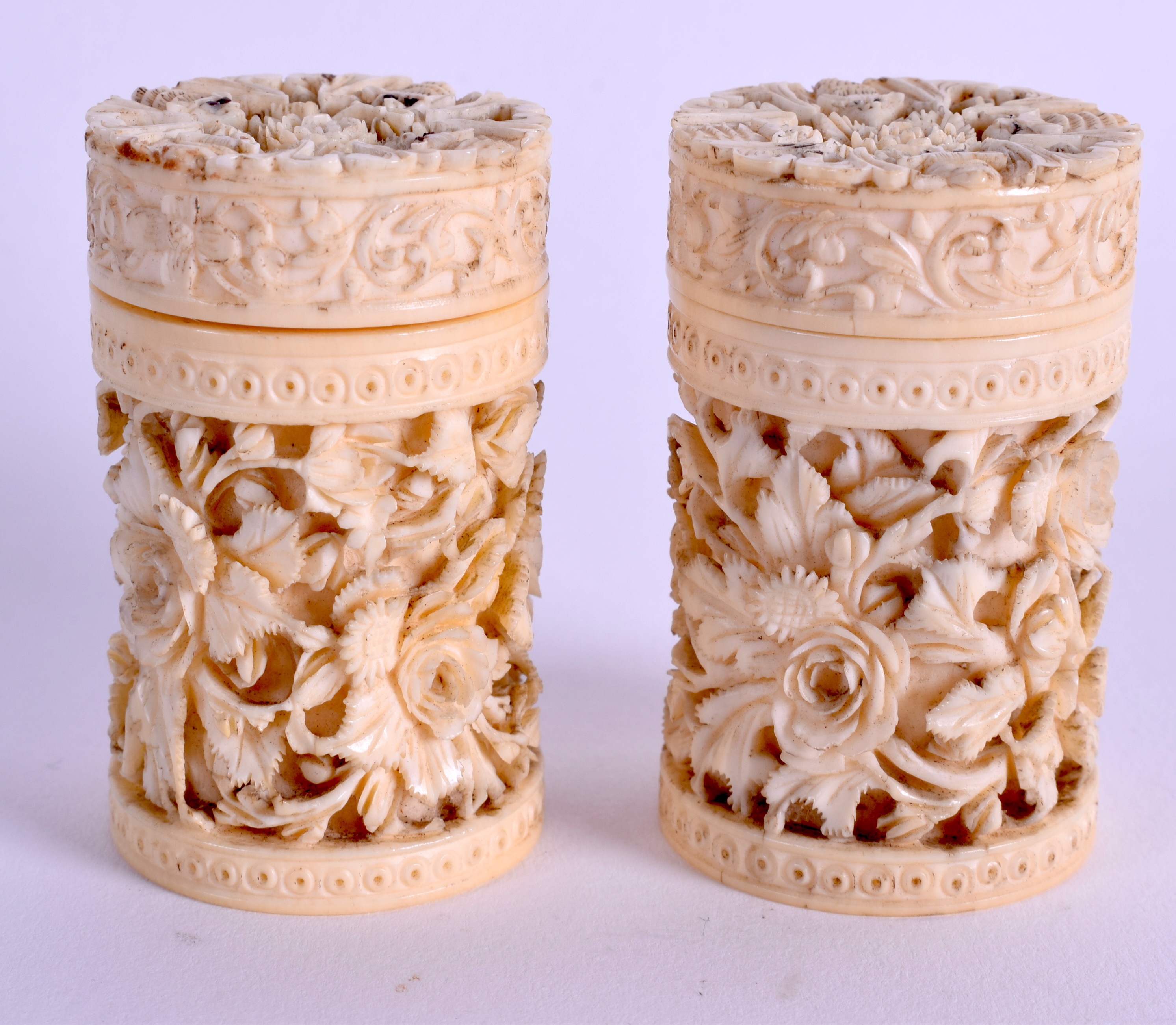 A PAIR OF 19TH CENTURY CHINESE CARVED IVORY CANS. 4.5 cm high. - Image 2 of 3