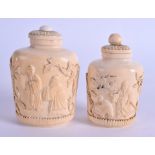 TWO 19TH CENTURY CHINESE CARVED IVORY SNUFF BOTTLES. 10 cm x 5.5 cm & 9 cm x 5 cm. (2)