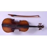 A VERY RARE EARLY 20TH CENTURY MINIATURE APPRENTICE VIOLIN with bow, of charming proportions. 24 cm